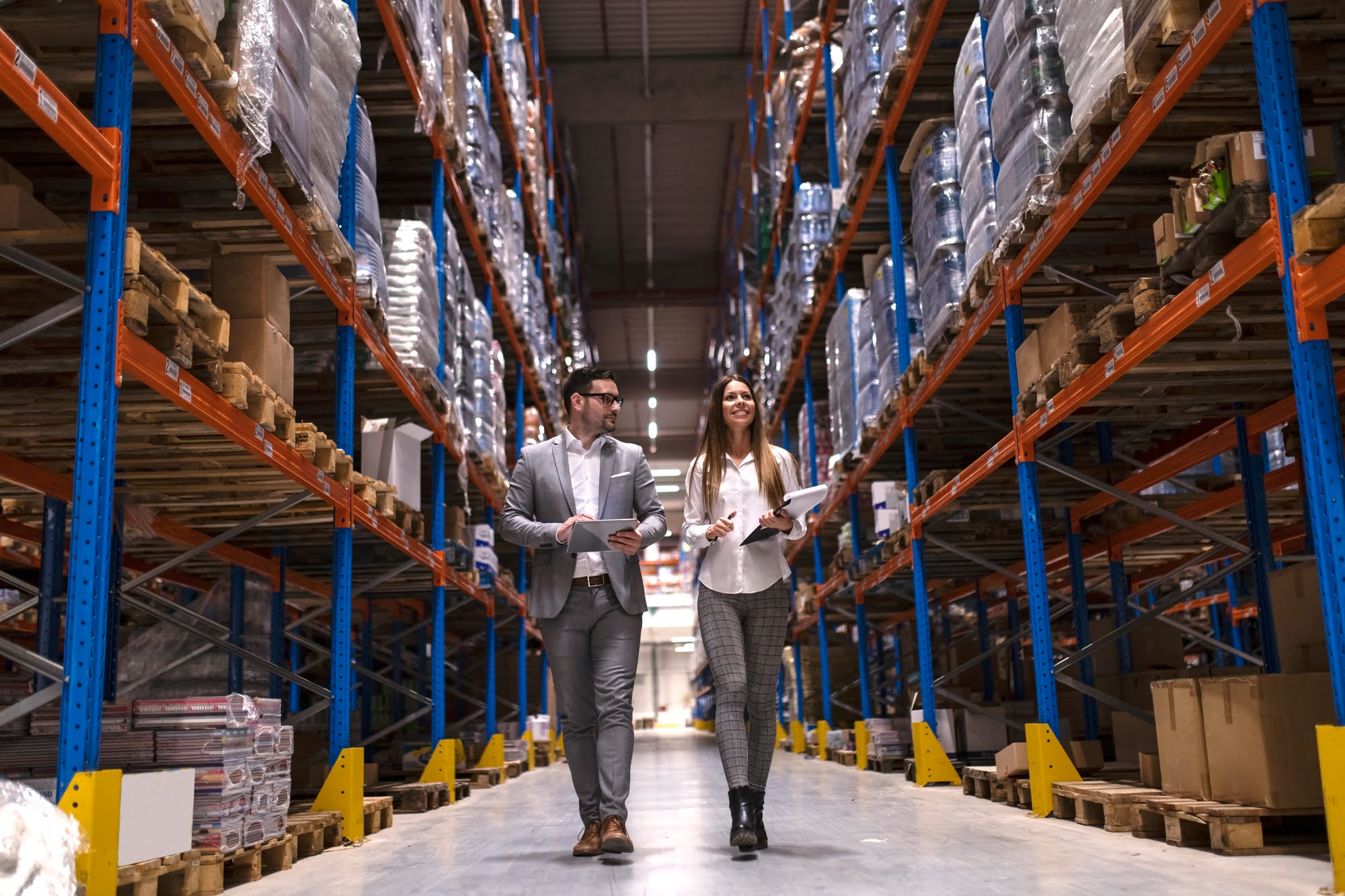 ISI logistics staff managing inventory in a federal warehouse.